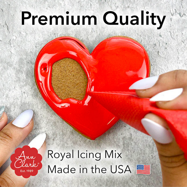 Red heart-shaped tool for royal icing mix with 'Ann Clark' branding and text about premium quality and USA manufacturing.